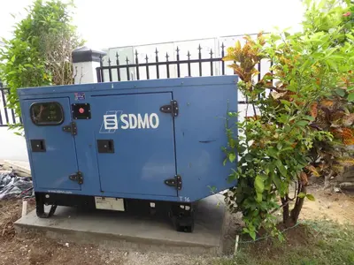 a blue utility box sitting next to a bush at Cozy Studios-Private Entrance- HS Internet-AC-Hot Water-Backup Generator-near the Beach in San Felipe de Puerto Plata