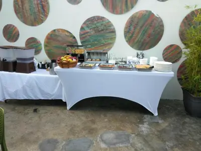 a table with a buffet of food on it at Studio 27 in Santo Domingo