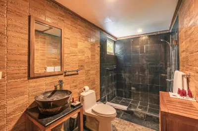 a bathroom with a sink and a toilet and a shower at Glamorous w Jacuzzi Balcones del Atlntico in Portillo