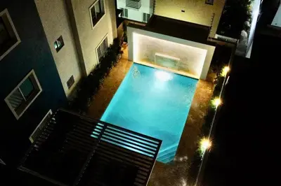 an overhead view of a swimming pool in a building at Spectacular PentHouse with private jacuzzi terrace in Santiago de los Caballeros
