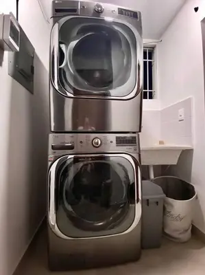 two microwaves stacked on top of each other in a kitchen at Spectacular PentHouse with private jacuzzi terrace in Santiago de los Caballeros