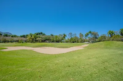 a sand bunker on a golf course at Xeliter Green One Playa Dorada in San Felipe de Puerto Plata