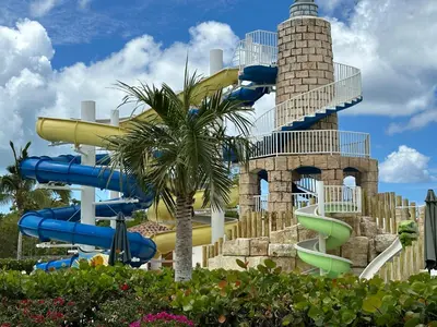 a water slide in front of a water park at Hotel Palmera Bayahibe in Bayahibe