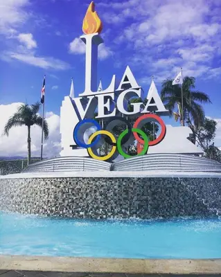 a large sign with the olympics on top of a building at Beautiful Penthouse in La Vega, RD in Concepción de La Vega
