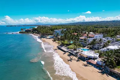 an aerial view of the beach in front of a resort at Studio Beachfront Kite Beach in Cabarete
