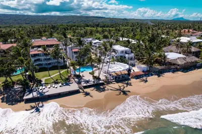 an aerial view of a resort on the beach at Kite Beach Oceanfront Two Bedroom Patio and Garden in Cabarete
