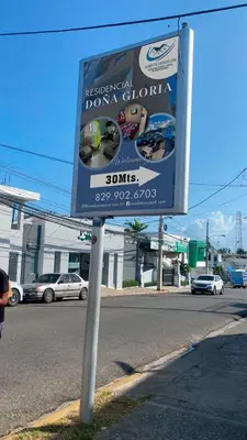 a street sign on the side of a road at RESIDENCIAL DOÑA GLORIA in San Felipe de Puerto Plata
