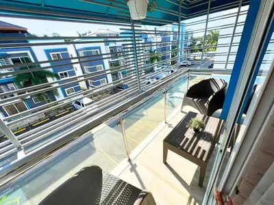 a balcony with a swimming pool on a building at Escapade tropicale in Santiago de los Caballeros
