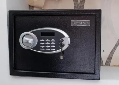 a black box with a phone with a handset at Cozy 1bd with common Jacuzzi in Sosúa