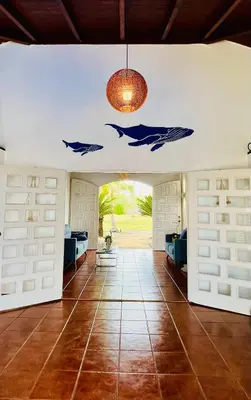 a living room with dolphins painted on the ceiling at PALM HOUSE - LUXURY VILLA - SAMANÁ - Ocean Front in Sánchez