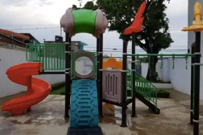 a colorful playground with a slide at Comodas 3 Habitaciones, Wifi 1er piso in Santiago de los Caballeros