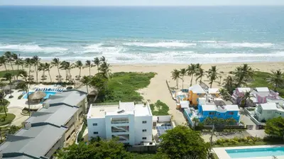 an aerial view of a resort and the beach at Amazing Ocean Front - 2 bedroom Apartment (117 sq meters) in Cabarete