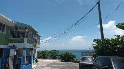 a view of the ocean from a street at Apto 2Habitaciones con Aire y Vista al Malecón de Samaná in Santa Bárbara de Samaná