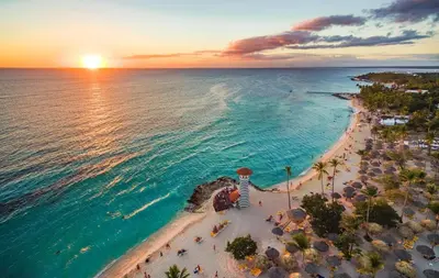 an aerial view of a beach at sunset at Espectacular BZII, bayahibe in Bayahibe