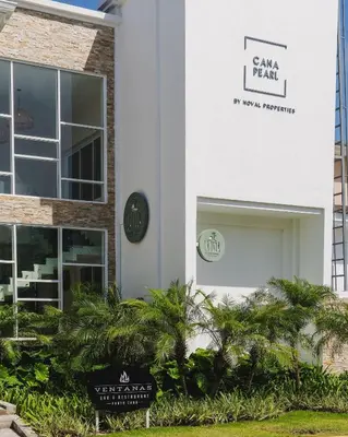a building with a sign that reads camp i heart at Spectacular Apto Pool Golf View in Hard Rock Golf in Punta Cana