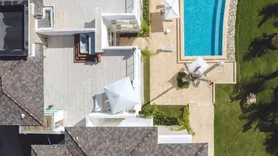 an overhead view of a building and a swimming pool at Hard Rock Area PH • Private Jacuzzi + Beach Views in Punta Cana