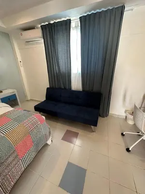 a bedroom with a blue bed and a window at Noè Hotel 1 king bedroon #7 in Punta Cana