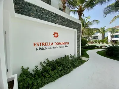 a sign for the entrance to the destin dominos hotel at My Dominicus Beach Retreat in Bayahibe