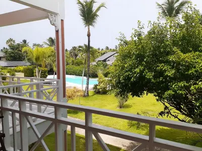 a view of the pool from the balcony of a house at Paradise Apartment with senic pool in beach area in El Callejón