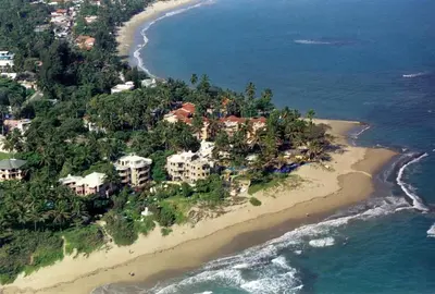 an aerial view of a resort on a beach at El Magnifico in Cabarete