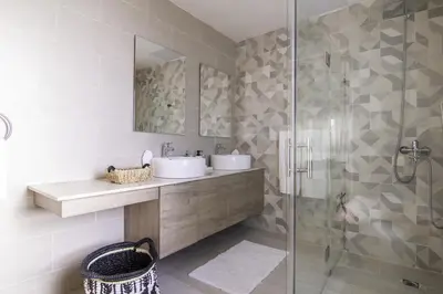 a bathroom with a sink and a shower at New Beachfront Penthouse in Las Terrenas