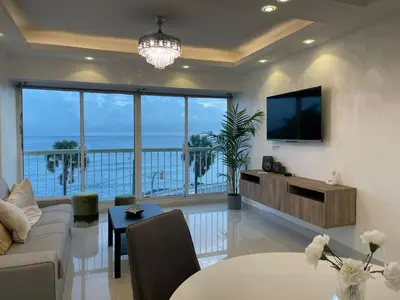 a living room with a view of the ocean at Villa Marbella by Potenza Rentals in Santo Domingo