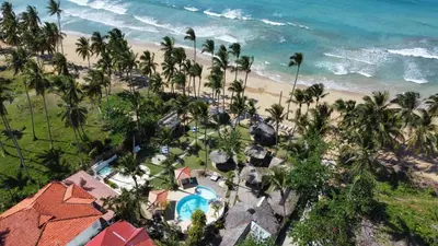 an aerial view of a resort near the beach at Hotel Casa Coson in Las Terrenas