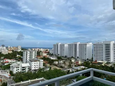 a view of a city with tall white buildings at Chic and Relax Apartamento Juan Dolio in San Pedro de Macorís