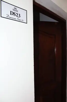 a sign above a door in a room at Dominican Suite 23, Incredible 1 Bed Apt (DS23) in San Felipe de Puerto Plata