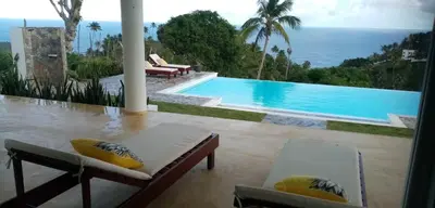 a view of a swimming pool from a house at Villa del Mar in Punta Balandra