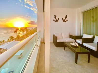 a living room with a view of the ocean at 703 Marbella 2 bedrooms Beachfront Beautiful Apartment in San Pedro de Macorís