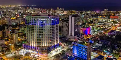 a view of a city at night with at Hotel Conquistador Santo Domingo in Santo Domingo