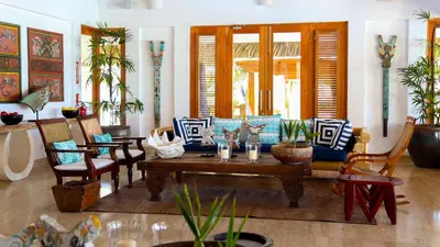 a living room with a couch and chairs at Unique 1BDR Retreat with pool at Hard Rock Golf C. in Punta Cana
