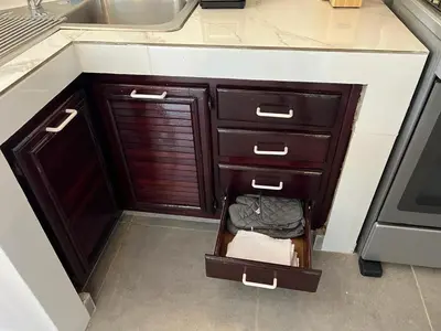 an open drawer in a kitchen with a sink at Playa Bonita 4 minute walk from our private Villa Anantara Bonita in Las Terrenas