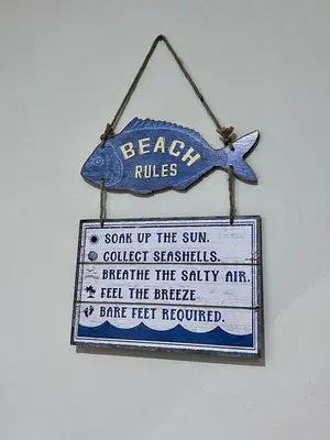 a sign that says beach rules with a fish on it at Private Pool View 2BDR in Los Corales Punta Cana in Punta Cana