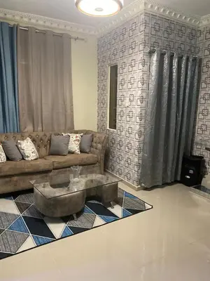 a living room with a couch and a coffee table at Pen House Vista Sur in Baní