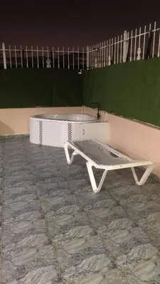a white bath tub sitting in a room at Pen House Vista Sur in Baní