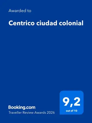 a screenshot of a cell phone with the text caffe guidedcolo at Centrico ciudad colonial in Santo Domingo