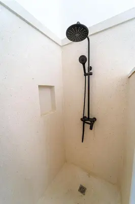 a shower in the corner of a room at Casa Panamera- 5br luxury beach Villa Playa Coson in Las Terrenas
