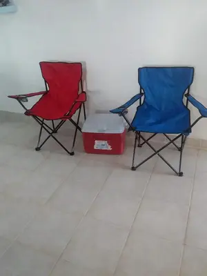 two red and blue chairs sitting in a room at Best bed and breakfast in Samana Breakfast Included in Santa Bárbara de Samaná