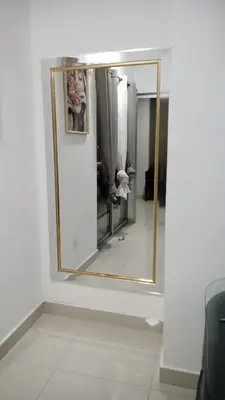 a mirror on a wall in a room at The most comfortable apartment in Boca Chica in Boca Chica