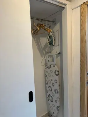 a room with a hanging object on a wall at Noe Hotel Punta Cana in Punta Cana