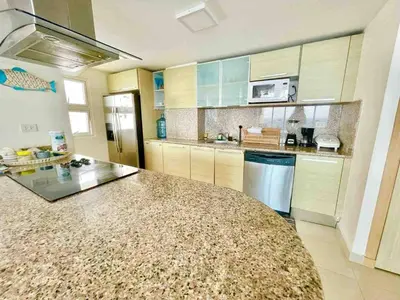a kitchen with a large counter top in a room at 3 Bedrooms At Marbella Beachfront Juan Dolio no820 in Juan Dolio