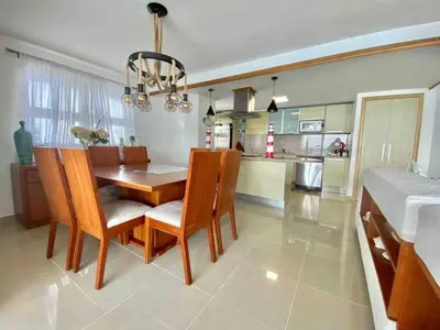 a dining room and kitchen with a table and chairs at 3 Bedrooms At Marbella Beachfront Juan Dolio no820 in Juan Dolio
