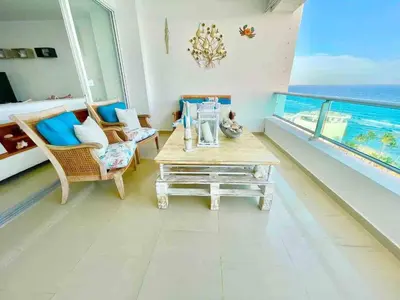 a living room with a view of the ocean at 3 Bedrooms At Marbella Beachfront Juan Dolio no820 in Juan Dolio