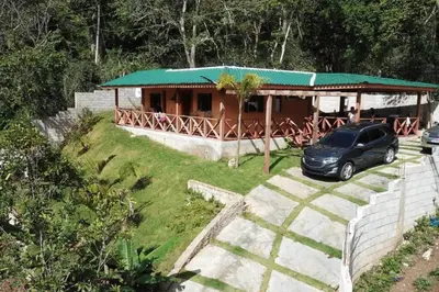 a car parked in front of a house at Villa Zarina - Polo Barahona in Polo