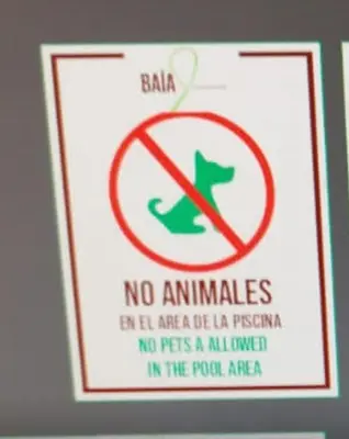 a no animals sign on a bathroom door at 2 Bedrooms at Baia Residences in Santiago de los Caballeros