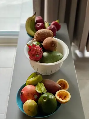 two bowls of fruit sitting on a table at Apartment in Estrella, Dominicus-Bayahibe in La Laguna
