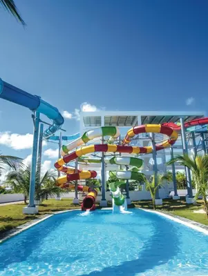 a water park with a roller coaster at Riu Palace Bavaro - All Inclusive in Punta Cana