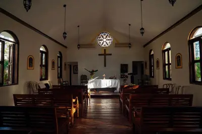 an inside view of a church with a table in the middle at Apartment in Dominicus in Bayahibe